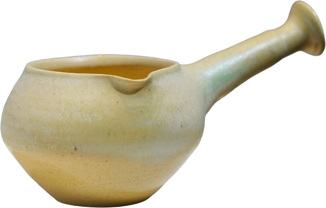 青黄釉侧把器